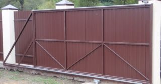 Купить откатные ворота из профнастила Выборг, цена от 1785 руб.