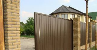 Купить откатные ворота из профнастила Выборг, цена от 1785 руб.